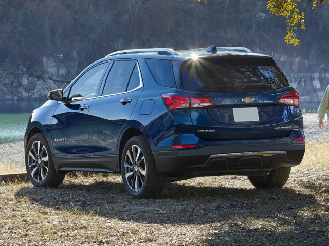 Rear view of the Chevrolet Equinox Premier trim parked by a river