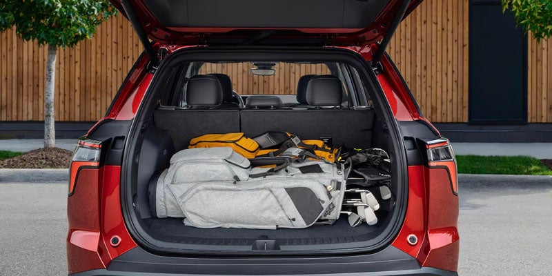 Chevrolet Equinox open trunk with golf clubs
